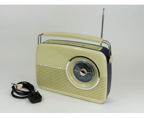 BUSH RADIO. A reproduction Bush TR82 series radio, with photocopies of the original Bush leaflet & certificate of authenticit