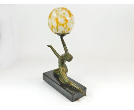 ART DECO LAMP. An Art Deco, green painted metal, figural table lamp with marble glass shade. Length 30cm, height 44cm.  Pleas