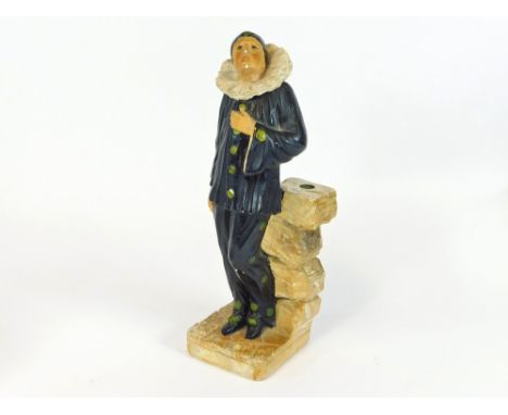 ART DECO LAMP BASE. An Art Deco plaster lamp base, modelled as Pierrot. Lacks lamp fitting. Rd No. 79270. Max. height 29cm.  