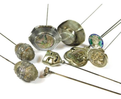 SILVER & WHITE METAL HAT PINS. Nine various silver & white metal hat pins including a silver & enamelled hat pin, a large Alp