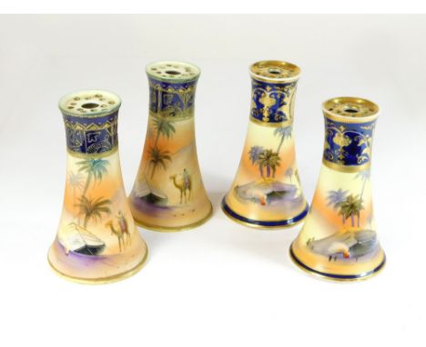 HAT PIN STANDS. Four Noritake porcelain, hand painted hat pin stands. Height 12cm.  Please note that all items in this auctio