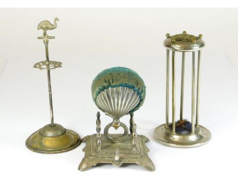 HAT PIN STANDS. Three metal hat pin stands.  Please note that all items in this auction are previously owned & are offered on