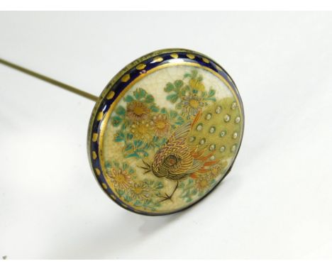 SATSUMA HAT PIN. A large Japanese Satsuma hat pin. To the reverse a stamped lozenge mark. Length 21.5cm, diameter 3.5cm.  All