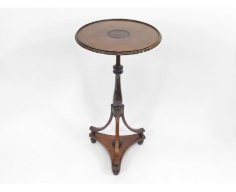 OCCASIONAL TABLE. A mahogany & inlaid tripod occasional table. Height 77cm.  Please note that all items in this auction are p