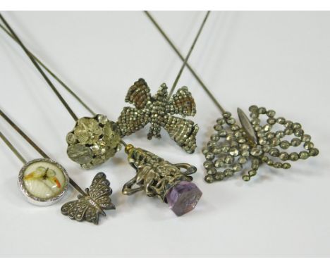BUTTERFLY HAT PINS. Six various butterfly theme hat pins in hinged cut steel, silver coloured metal, base metal & a button co
