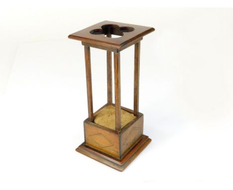 HAT PIN STAND. An Arts & Crafts wooden hat pin stand. Height 18.5cm.  Please note that all items in this auction are previous