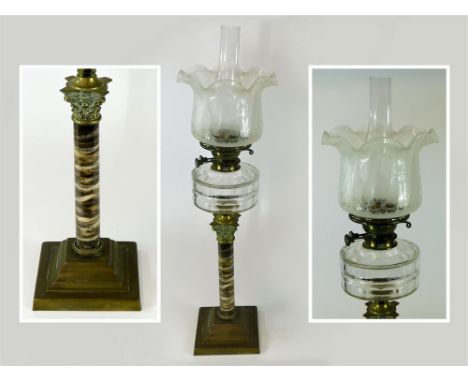 OIL LAMP. A Victorian oil lamp with a brass mounted ceramic, faux marble column, clear glass reservoir & etched shade. Full h