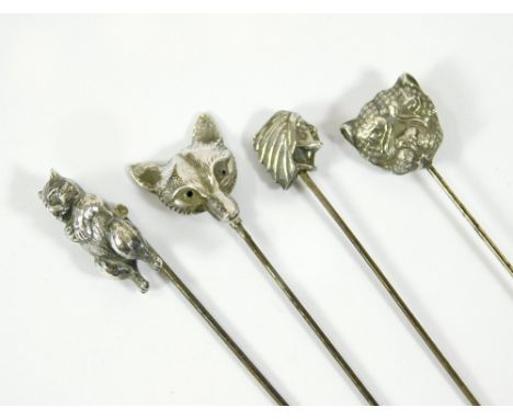 SILVER FOX ETC. A hinged silver fox hat pin & a silver hinged bear hat pin. Also, a white metal, double faced cat/dog hat pin