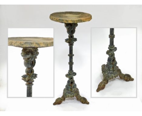 CAST IRON PLANT STAND. A cast iron plant stand on tripod base with concrete slab top. Height 110cm. COLLECT IN PERSON OR BY B