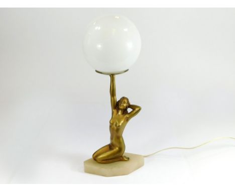 ART DECO LAMP. An Art Deco, gilt metal table lamp fitted an opaque white glass shade. Max. height 38cm, width 16cm.  Please n