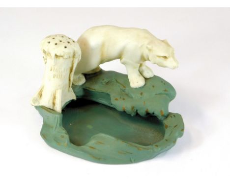 HAT PIN STAND. A German bisque 'North Pole' hat pin stand. Width 13.5cm.  Please note that all items in this auction are prev
