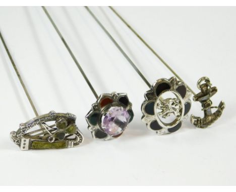 SILVER & HARDSTONE. Three Victorian Scottish silver & hardstone hat pins, including two hinged pins. Also, an Irish harp pin 