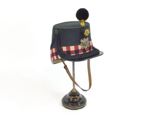 HIGHLAND INFANTRY SHAKO. A Victorian Highland Light Infantry shako by Marshall & Aitken, Edinburgh.  Please note that all ite