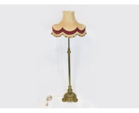 STANDARD LAMP. A Victorian brass standard lamp, height including lamp holder, 167cm. Also, a large silk, lace & velvet shade.