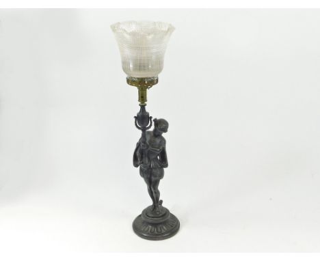 TABLE LAMP. A painted Spelter figural gas table lamp with glass shade. Full height including shade 52cm.  Please note that al