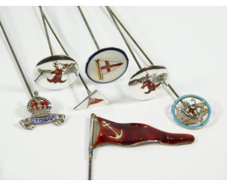 SILVER & ENAMEL. A pair of silver & enamelled hind hat pins, two hinged hat pins & three pennant hat pins. Longest 25cm.  All