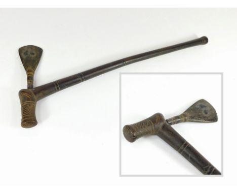 WOODEN AXE. A ceremonial wooden axe, possibly African. Length 45cm.  Please note that all items in this auction are previousl