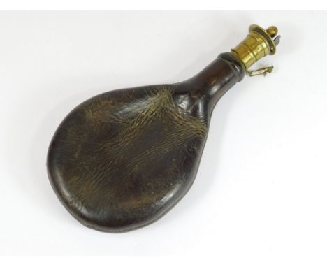 SHOT FLASK. A 19th century leather shot flask with heart-shaped spring action. Length, 20cm. (With contents).  Please note th