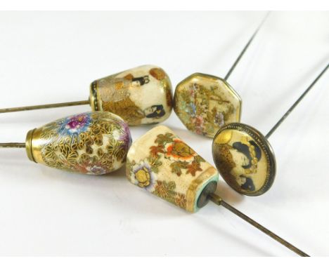 SATSUMA HAT PINS. Two Japanese Satsuma flat topped hat pins, one with stamped mons mark. Also, two domed hat pins & one taper
