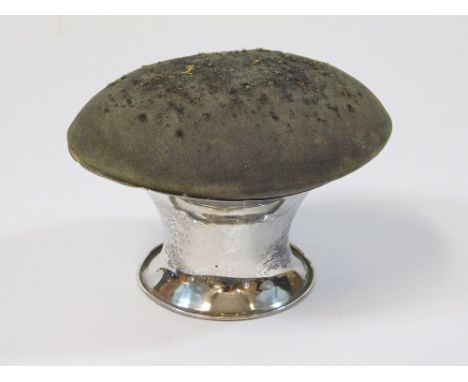 SILVER HAT PIN STAND. A William Comyns waisted hat pin stand, Birmingham 1910. Upper width 12cm.  Please note that all items 