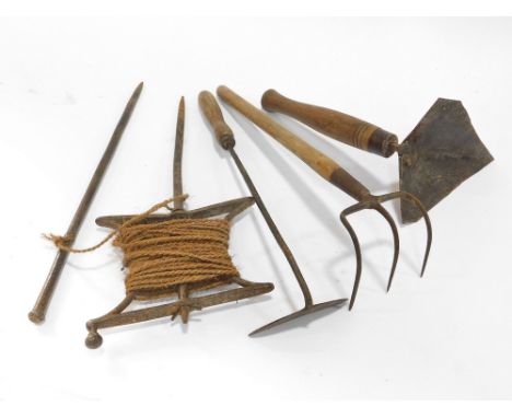 VINTAGE GARDENING TOOLS. A vintage garden line & three cultivating tools. All require cleaning & refurbishment.   Please note