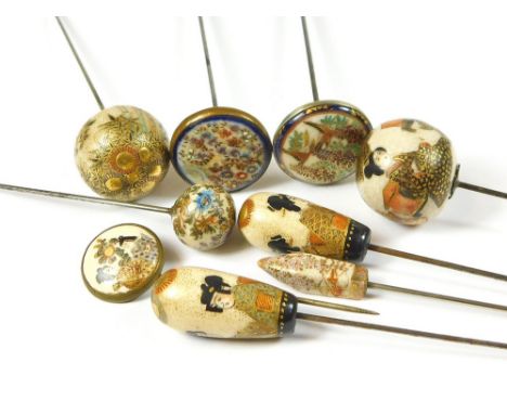 SATSUMA HAT PINS ETC. A pair of Japanese Satsuma domed, tapering hat pins. Also, three flat topped hat pins, one stamped, a p