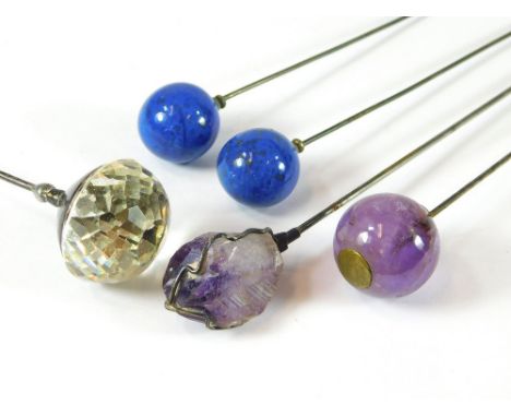 SEMI-PRECIOUS STONES ETC. A pair of amethyst hat pins, a pair of lapis lazuli hat pins & a faceted glass hat pin. Longest 27c