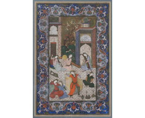 A 19TH CENTURY PERSIAN MANUSCRIPT. Depicting a dancer and musicians within an interior, within a broad border of scrolling fo