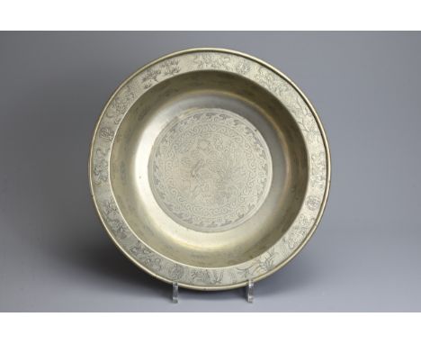 A LARGE CHINESE PAKTONG BASIN, 19/20TH CENTURY. With deep sides and everted rim incised with phoenix within cloud bands with 