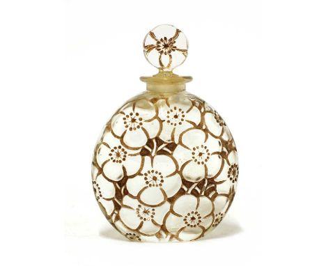 A René Lalique 'Le Lys' flacon, moulded with flower heads with sepia staining, moulded 'R Lalique' and with a faint etched nu