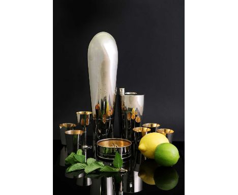 A silver-plated 'Rocket' cocktail shaker,designed by J A Henkels, Solingen, comprising: five beakers, a flask with a screw ca