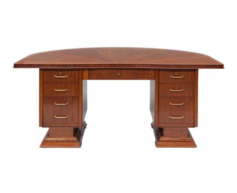 An Art Deco Cuban mahogany desk,attributed to Alfred Portneuve, c.1930, the semicircular top with a fan veneer, over a centra