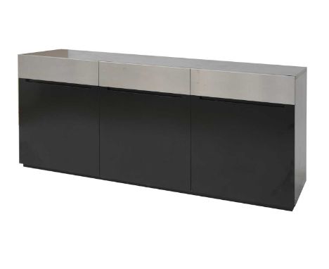 An ebonised and polished aluminium sideboard, 1970s, with three frieze drawers and three cupboards, each enclosing a single s