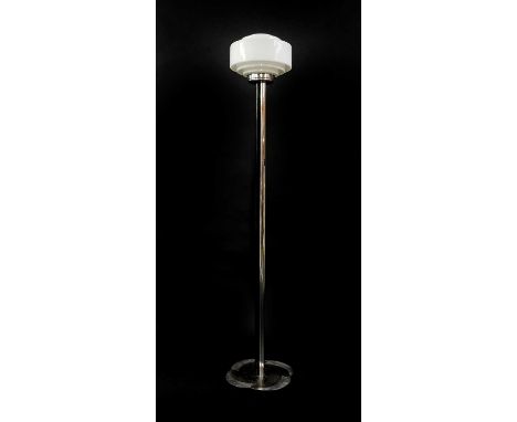 An ebonised and chrome Art Deco standard lamp, with a stepped opaque glass shade, on an ebonised and chrome column, raised on