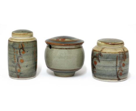 *David Leach (1911-2005), three lidded stoneware jars, for Lowerdown Pottery, with a washed cobalt glaze, painted trailing ir