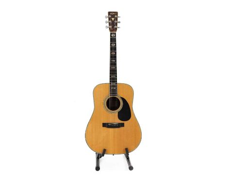A 1975 K. Yairi YW600 Japanese acoustic guitar,serial number 6***, of dreadnought form, the neck and body with abalone inlays