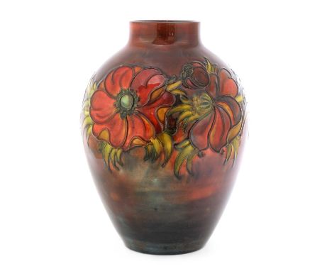 A Walter Moorcroft flambé-glazed 'Anemone' pattern vase,of ovoid shape with a slender neck, with tubeline decoration, painted