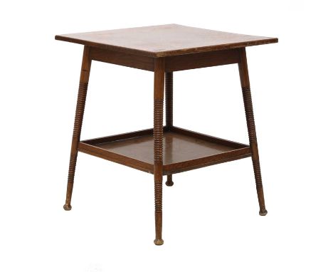 An oak occasional table,in the manner of E W Godwin, with an undertier, raised on slanted, tapering, bobbin-turned supports,5