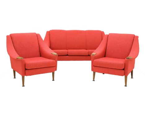 A Danish three-piece suite,1960s, comprising; a two-seater sofa,of slightly curved form, upholstered in red wool fabric with 