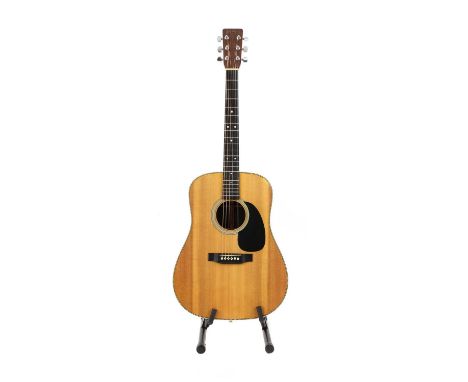 A 1982 Martin &amp; Co. D28 acoustic guitar,serial number 4****4, of dreadnought form with arrowhead binding and a black scra