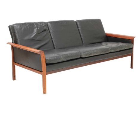 A Danish black leather sofa, §1960s, designed by Hans Olsen for C S Møbler in Denmark, with a loose seat and back cushions, a