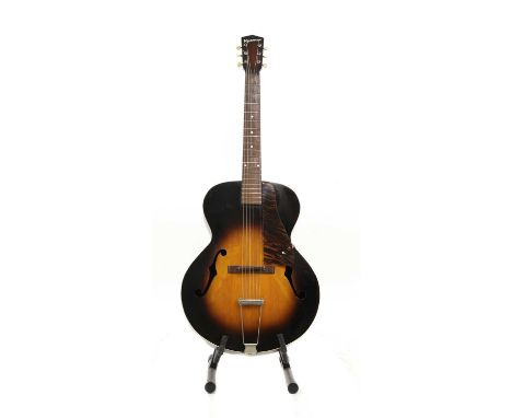 A Kalamazoo KG-31 archtop acoustic guitar, c.1940, the spruce top in a sunburst finish with mahogany back and sides, white bi