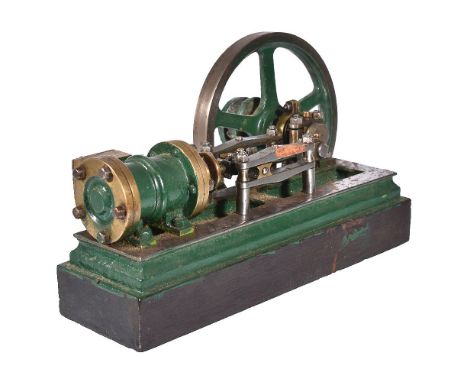 A vintage model of a horizontal live steam mill engine, the single cylinder with connecting rod and cross-head guides, open c