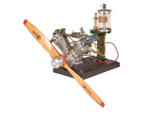 A well-engineered model of an internal combustion twin cylinder air cooled aero engine, with fitted 41cm propeller, fuel cont