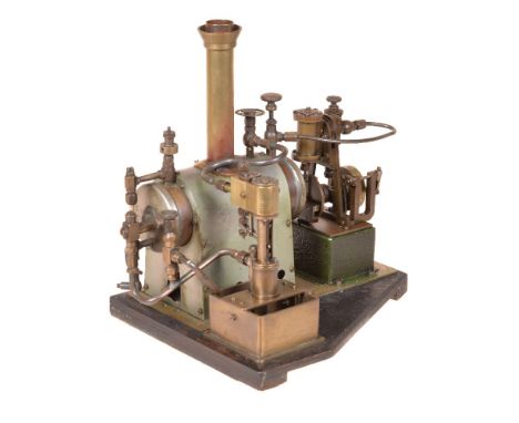 A period model of a live steam plant, having horizontal copper boiler with water sight glass, safety valve and linked to sing
