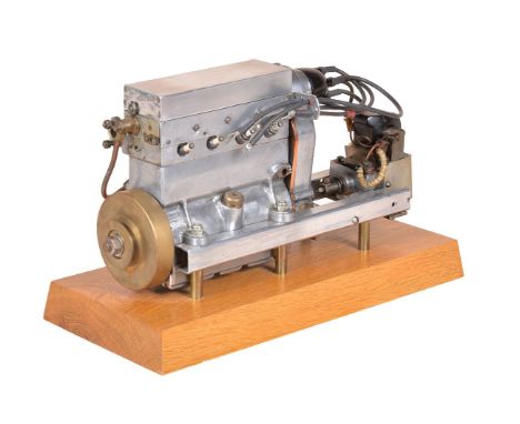 A well-engineered model of horizontally mounted internal combustion engine, with attached distributor, magneto and small gene