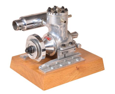 A well-engineered model of a single cylinder ‘GAN’ Internal combustion engine, with fitted exhaust and mounted on polished oa