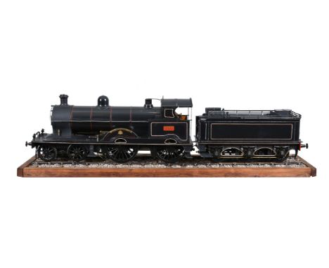 An exhibition quality 3½ inch gauge model of a London North Western Railway Precursor Class 4-4-0 live steam tender locomotiv