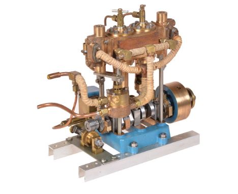 A well-engineered model of a twin simple vertical marine engine, with trunk guides above open crank and brass oiler cup, ecce