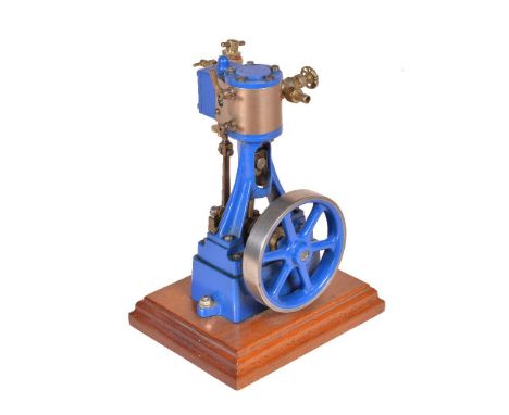 A model of a Stuart Turner 10V vertical live steam engine, having metal clad cylinder, trunk guide, open crank with eccentric